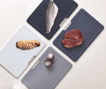 Joseph Joseph 4-piece cutting board set with holder - Folio - Grey